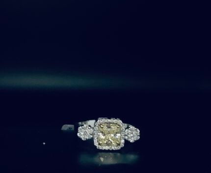 Diamond Ring on 18 K White Gold With Green Stone